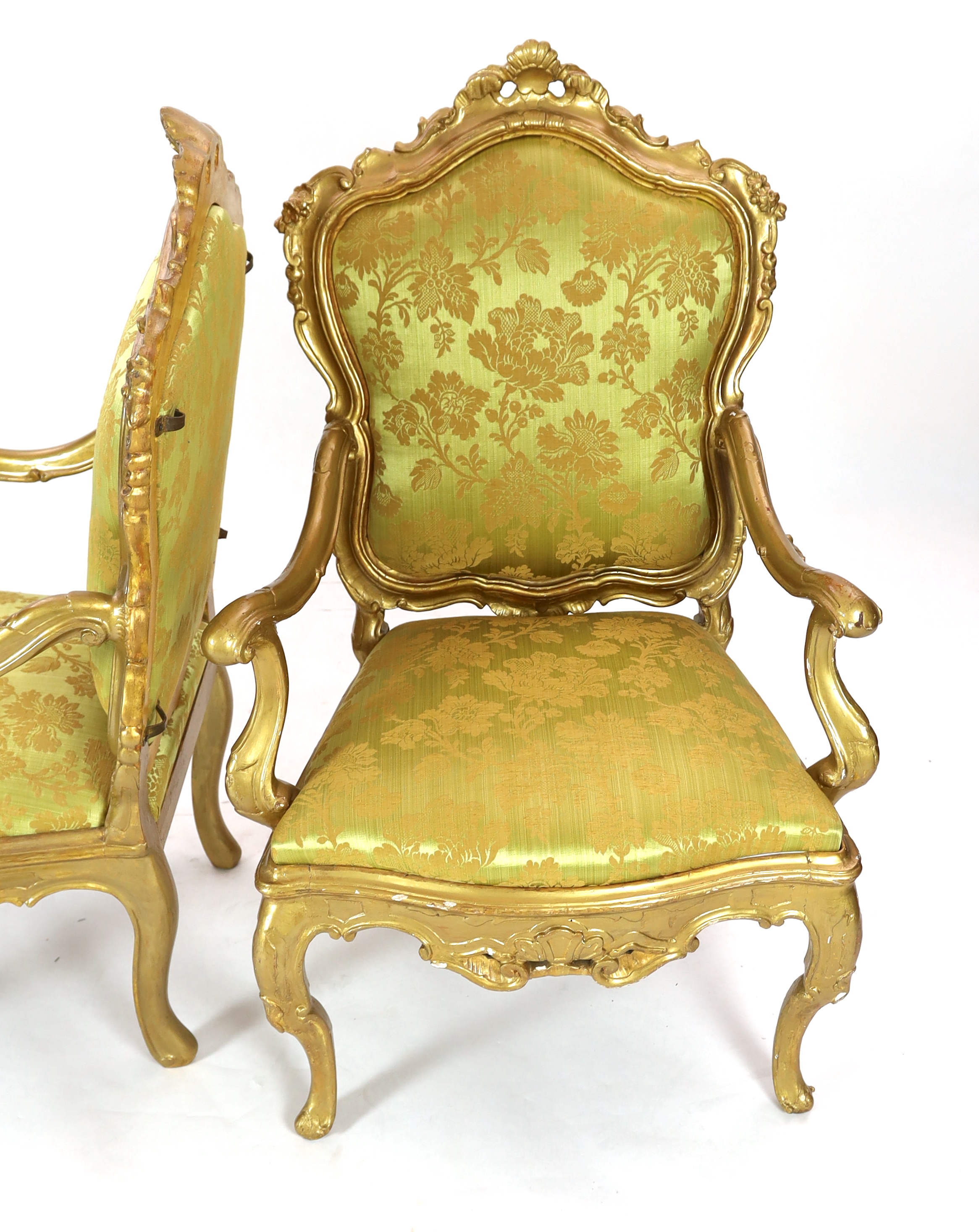 A set of six 18th century Venetian carved giltwood open armchairs, Please note this lot attracts an additional import tax of 5% on the hammer price